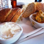 Fresh Baked Bread with two flavored butters: Champagne and Sun Dried Tomato
