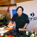 Chef Ming Tsai hands me a dish of his Sweet and Sour Pork on 2012-01-15 at Buick Food+Wine at St Regis Monarch, Dana Point 104