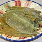 Peeled, seeded and sliced into strips