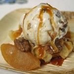 Belgian Liege waffle was topped with rum raisin ice cream and farmers market apples, caramel sauce and caramelized pecans