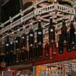 carousel of barrel aged cocktails above the bar