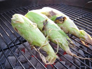 <p>Unhusked Corn On The Grill</p>