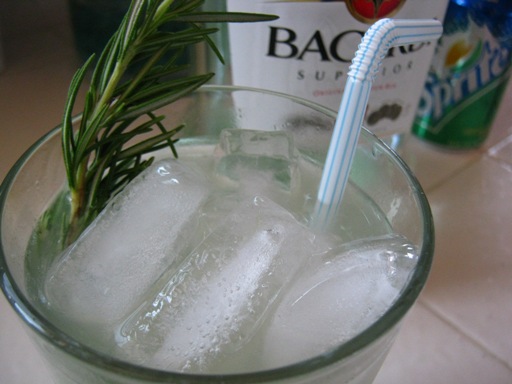Mojito infused with rosemary simple syrup and garnished with a sprig!