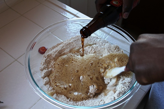 Pouring in the beer.