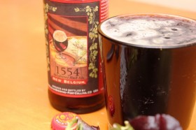 This is a dark ale indede. The glass is clear showing off the full color of this sily ale!