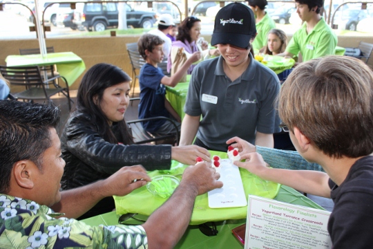 VIPs sample new flavors of Yogurtland yogurt.