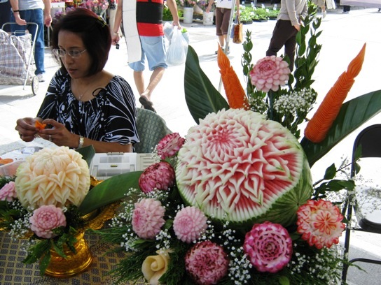 Thai style fruit and vegetable carving at the market.