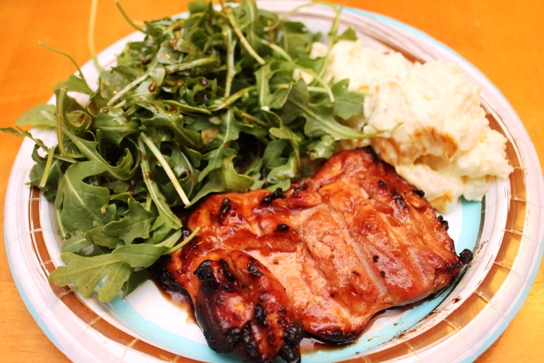 Plated for dinner: Grilled chicken with arugula and potato salad.