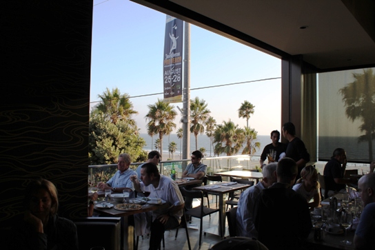 Floor to cieling windows in the second floor dining room open out to Manhattan Beach blvd.