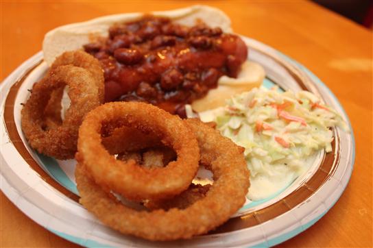 The prefect plating for onion rings: a chili dog and homemade slaw.