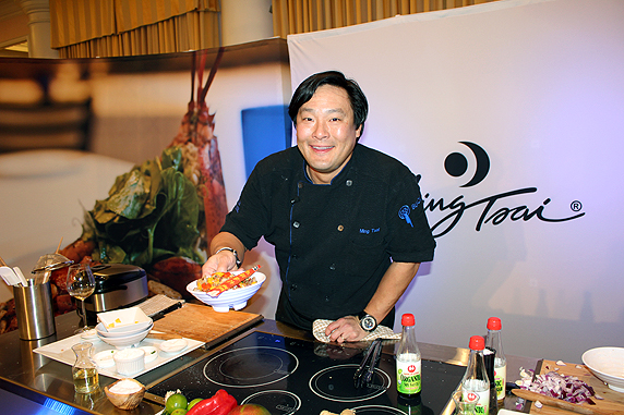 Chef Ming Tsai hands me a dish of his Sweet and Sour Pork on 2012-01-15  at Buick Food+Wine at St Regis Monarch, Dana Point 104