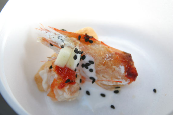 Deep fried shrimp head with ceviche and a shrimp chip