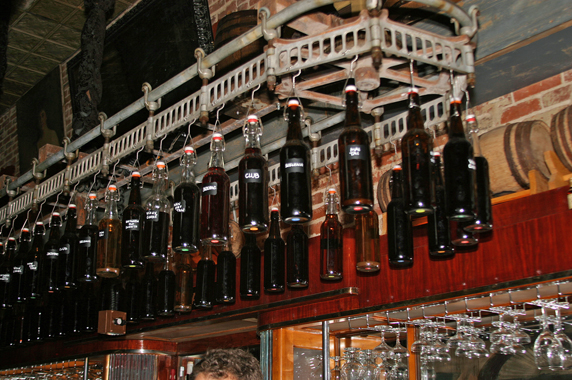 carousel of barrel aged cocktails above the bar