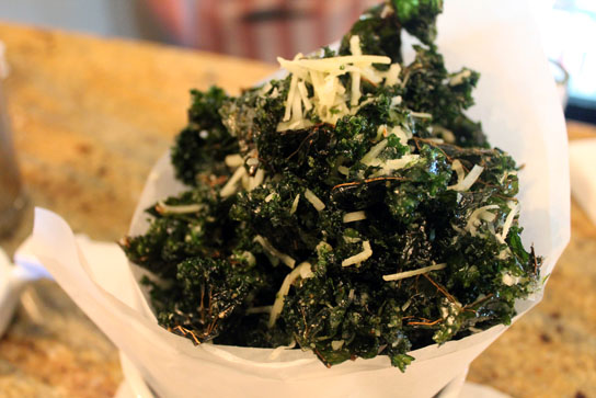 Deep fried kale with parmesan shavings.  The result is a smoky veggie flavor.