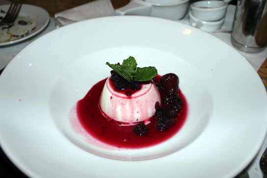 The panna cotta is a silky, cream based dessert reminiscent of strawberry cheesecake in flavor and firm yogurt in texture.