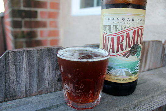 Warmer strong ale, from Hangat 24, is brewed with fresh spruce, maple syrup, and spices.