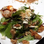 Baked pear salad, topped with Cabrales cheese with sherry vinaigrette