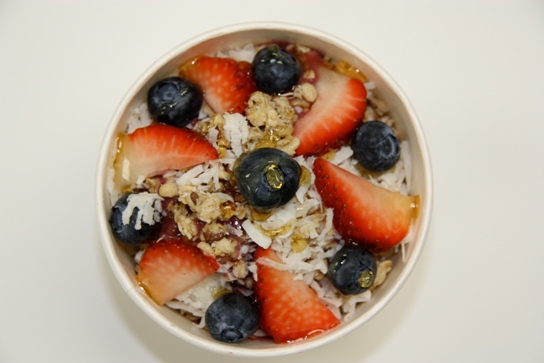 The Bowl of Heaven Lime-A-Licious Bowl with Açaí, strawberries, blueberries, pineapple, key lime, peaches, coconut water, and Maq 7 juice