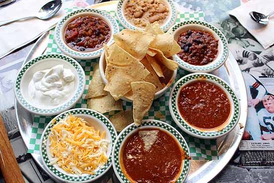The Chili Sampler features five samples of chili and all the finxings to personalize each bowl.