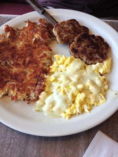 House made sausage with scrambled eggs and hasbrowns.