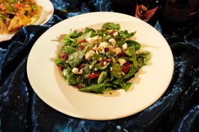 Baby arugula, sliced grilled chicken, pecans, dried cranberries and fresh oranges tossed in lemon balsamic vinaigrette, topped with crumbled feta cheese,