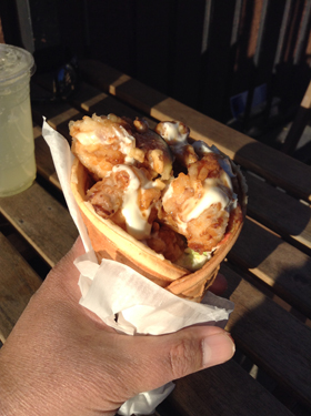 Buttermilk chicken cone drizzled with goat cheese fondue