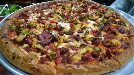 Aloha's Pizza sport Hawaiian names like Kamehameha  and "Da Pele".  Pele comes with Pepperoni, Portuguese sausage, bacon, jalapenos, and pineapple.