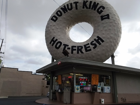 A larger than life donut sits on top of Donut King II, located at the corner of Western and Marine in Gardena.