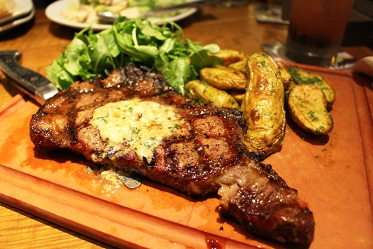 The crazy good grilled ribeye steak.