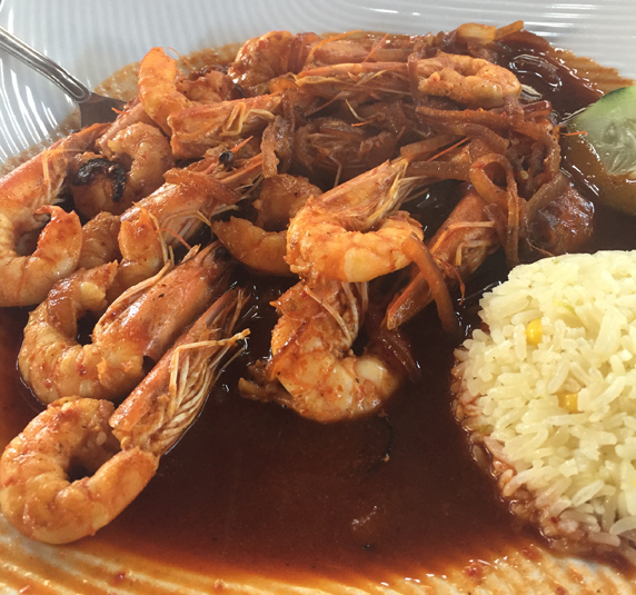 Camarones a la Diabla - shrimp with onion and spicy red sauce.