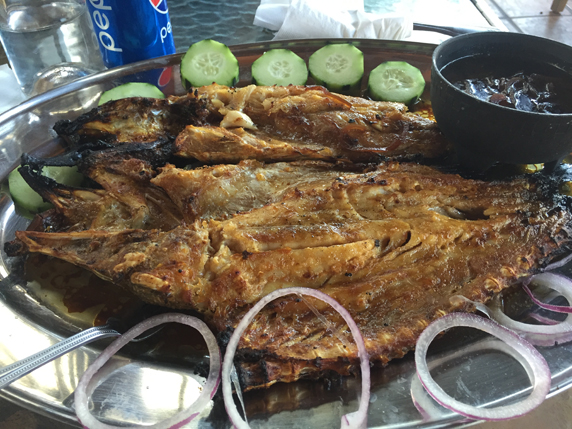 Pescando Zarandeado - tortillas, special sauce with caramelized onions. 