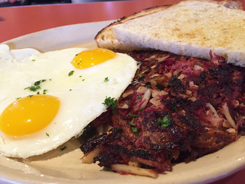 Corned Beef Hash with caramelized poblanos, onions and 2 eggs