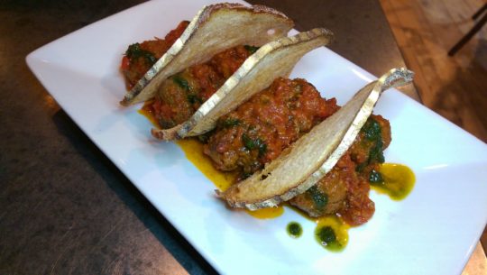 Traditional meat balls and crostini.