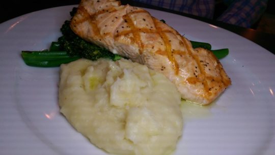 Grilled salmon on a bed of cauliflower and potato mash.