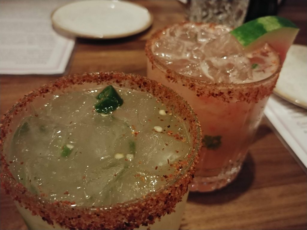 In front, Jefe's Spicy Margarita with serrano chiles and in back, La Sandia Margarita with watermelon.